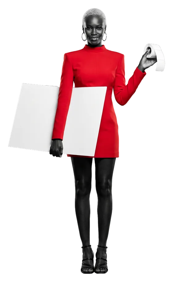Simone Okafor peeling a blank label from a roll, a board at her hip